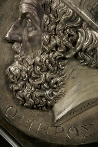 A pair silvered copper repouss circular bas relief portrait roundels