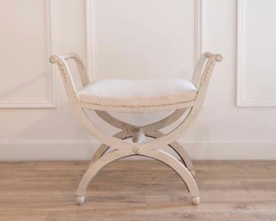 A period Gustavian stool with handles scraped to original paint