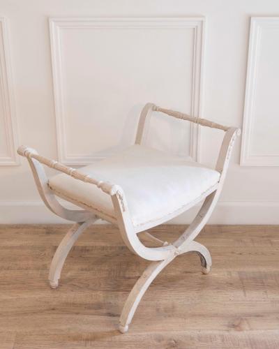 A period Gustavian stool with handles scraped to original paint