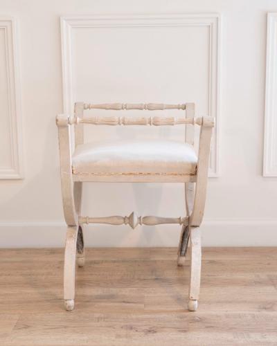 A period Gustavian stool with handles scraped to original paint