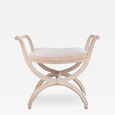 A period Gustavian stool with handles scraped to original paint