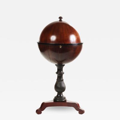A rare Biedermeier mahogany globe table Globustisch on tripod base 19thC 