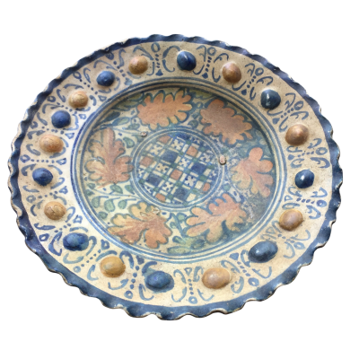 A rare Dutch Maiolica plate with checkerboard motif and oak leaves 17th century