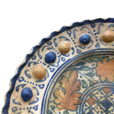 A rare Dutch Maiolica plate with checkerboard motif and oak leaves 17th century