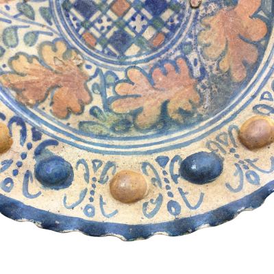 A rare Dutch Maiolica plate with checkerboard motif and oak leaves 17th century