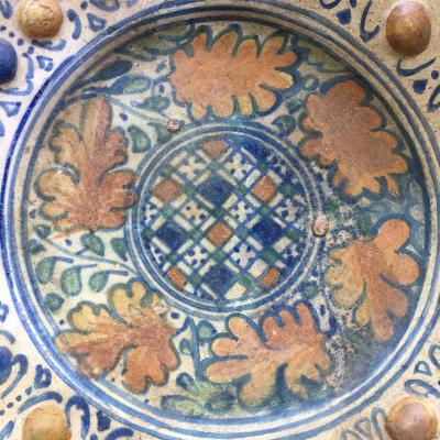 A rare Dutch Maiolica plate with checkerboard motif and oak leaves 17th century
