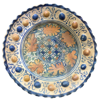 A rare Dutch Maiolica plate with checkerboard motif and oak leaves 17th century