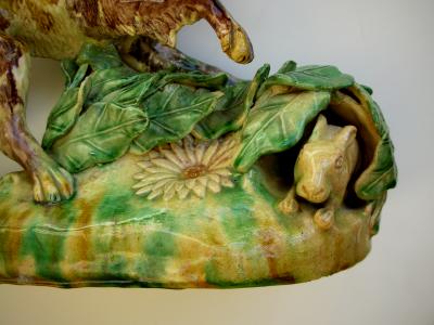 A rare English Yellow Ware figure of a hunting dog and hare
