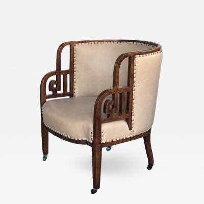 A rare English art deco barrel back chair in the Asian taste