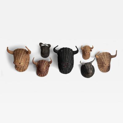 A rare collection of wicker bulls heads France 1950s 7 total