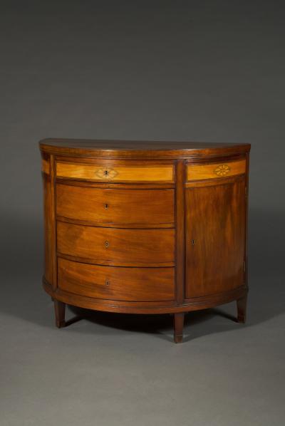 A rare pair of Frederick VI mahogany and satinwood inlaid demi lune commodes