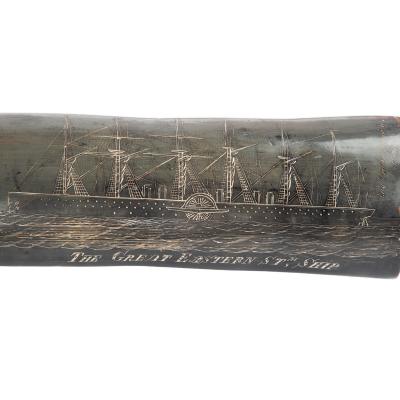 A rare scrimshaw decorated horn Signed and inscribed by the base by C Wood