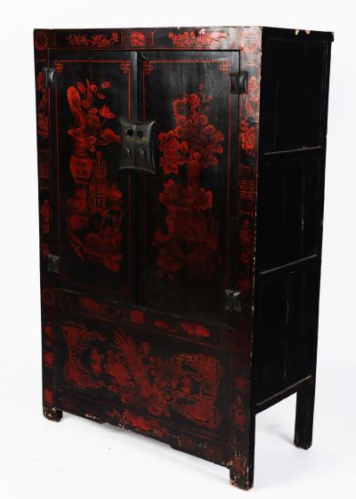 A red and black lacquered Chinese cabinet 19th C 