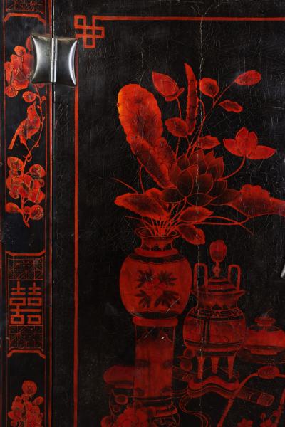 A red and black lacquered Chinese cabinet 19th C 