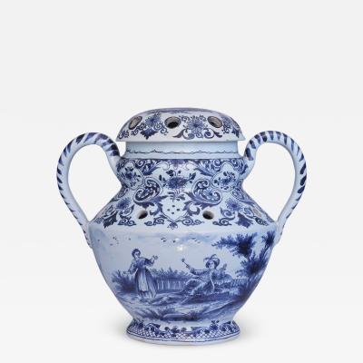 A round blue and white Delftware tulipiere from the 19th century