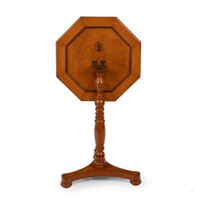 A satinwood hexagonal tilt top table