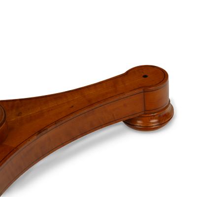 A satinwood hexagonal tilt top table