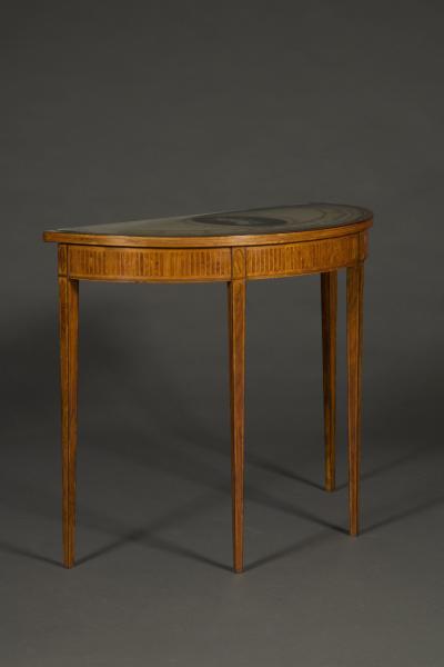 A satinwood tulipwood boxwood and ebony inlaid Demi Elliptical side table