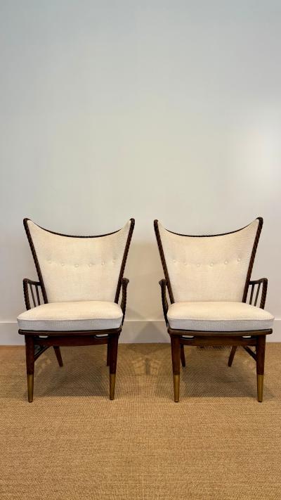 A sculptural pair of Italian wingback lounge chairs circa 1950s 