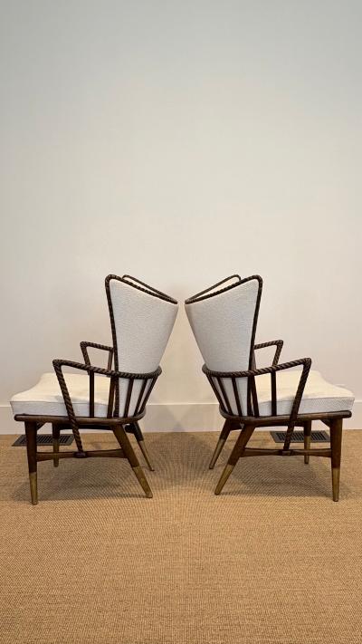 A sculptural pair of Italian wingback lounge chairs circa 1950s 