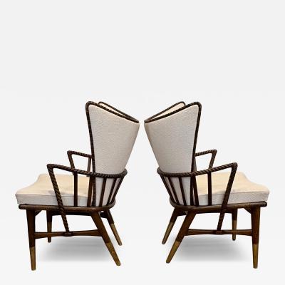 A sculptural pair of Italian wingback lounge chairs circa 1950s 