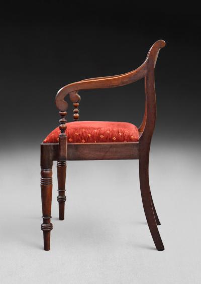 A set of 12 Regency Mahogany Dining Chairs