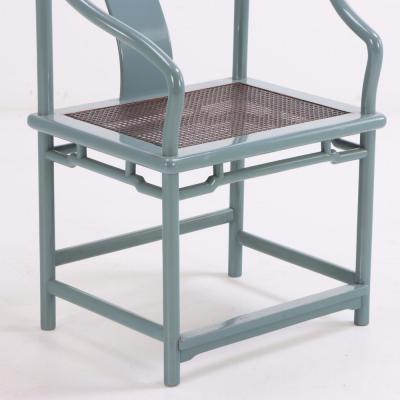 A set of 12 lacquered rounded back armchairs with cane seats C 1970 