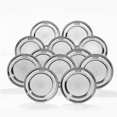 A set of 24 George III silver dinner plates by Naphtali Hart 1801