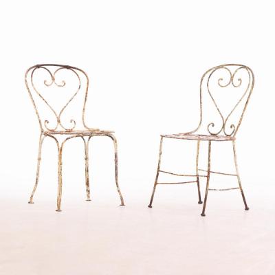 A set of 4 French iron garden chairs C 1950