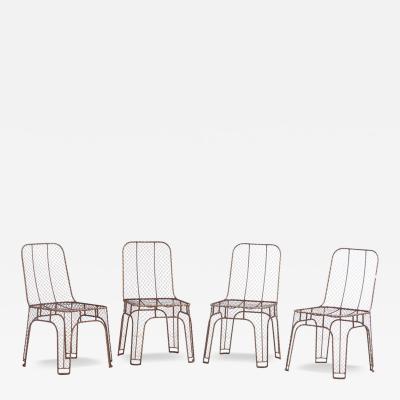 A set of 4 French iron side chairs C 1980 