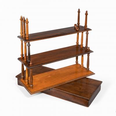 A set of Anglo Ceylonese specimen wood campaign wall shelves in a travelling box