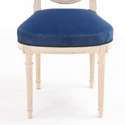 A set of Eight French Louis XVI style painted dining chairs C 1950