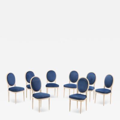A set of Eight French Louis XVI style painted dining chairs C 1950 