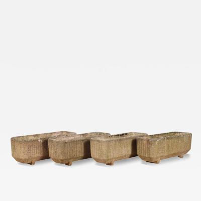 A set of Four French Modernist cast stone planters C 1960 