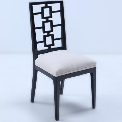 A set of four ebonized dining chairs in the manner of Parzinger circa 1950 