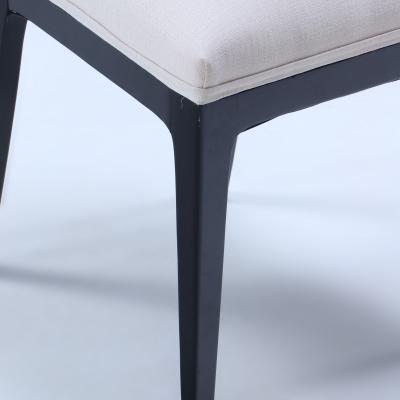A set of four ebonized dining chairs in the manner of Parzinger circa 1950 