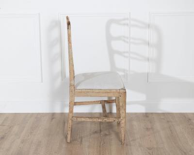 A set of four period Gustavian chairs scraped to original paint and newly covere