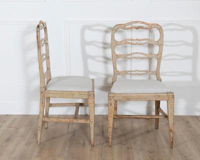 A set of four period Gustavian chairs scraped to original paint and newly covere
