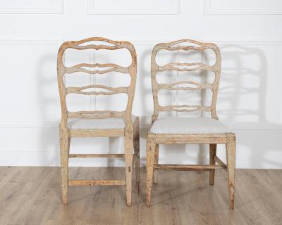 A set of four period Gustavian chairs scraped to original paint and newly covere