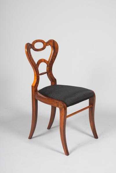 A set of four sleek and elegant Biedermeier side chairs