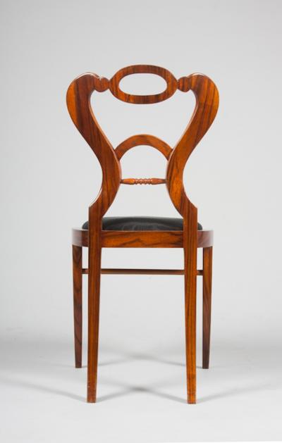 A set of four sleek and elegant Biedermeier side chairs