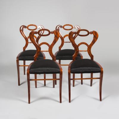 A set of four sleek and elegant Biedermeier side chairs