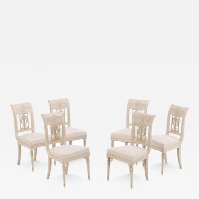 A set of six French Directoire style painted dining room chairs 19th C 