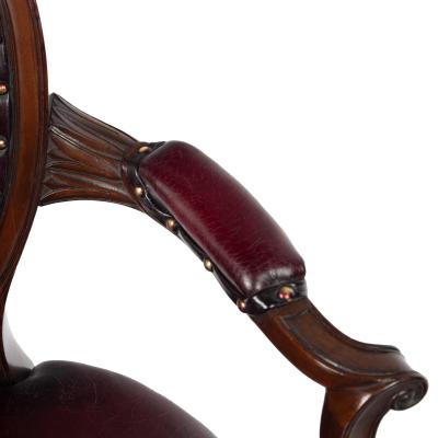 A set of ten Victorian mahogany dining chairs in the style of Hepplewhite