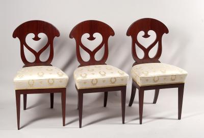 A set of three Biedermeier side chairs