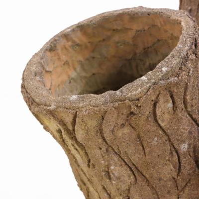 A set of three French tabletop faux bois cast stone planters C 1950 