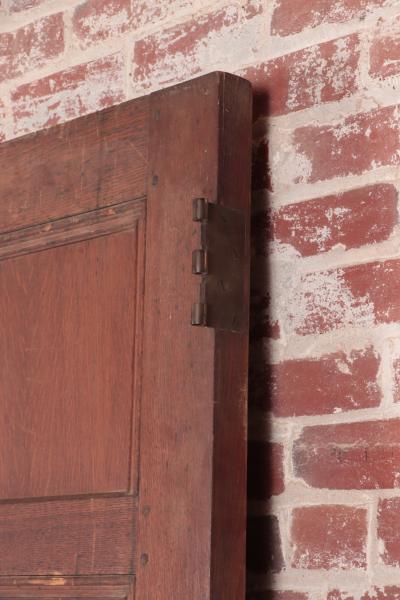 A set of two oak doors with eight panels each Circa 1900