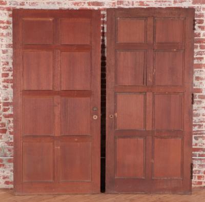 A set of two oak doors with eight panels each Circa 1900