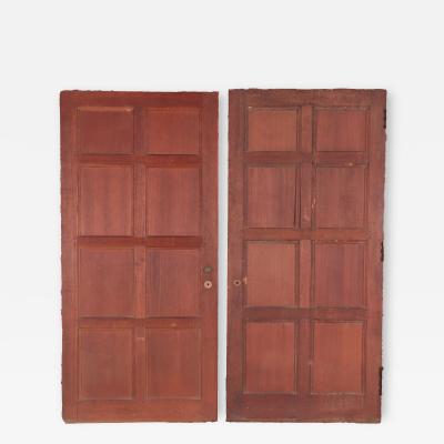A set of two oak doors with eight panels each Circa 1900