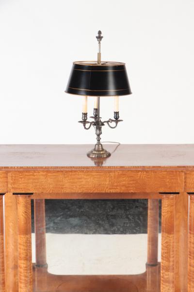 A silver plate Louis XVI style three branch Bouillotte lamp